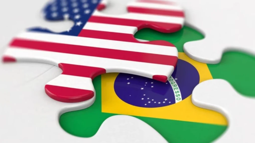 Peças de quebra-cabeça com as bandeiras dos EUA e do Brasil encaixadas, simbolizando relações comerciais e diplomáticas entre os países.